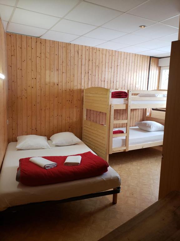 Postel nebo postele na pokoji v ubytování Hébergement Artense