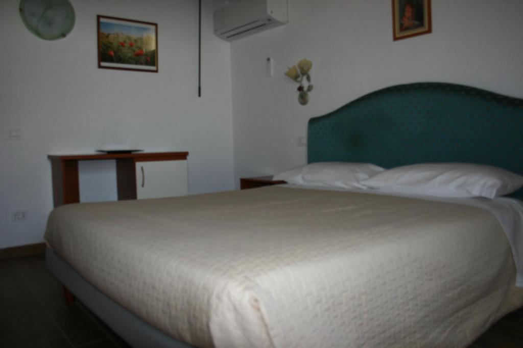 Posteľ alebo postele v izbe v ubytovaní A casa di Giò