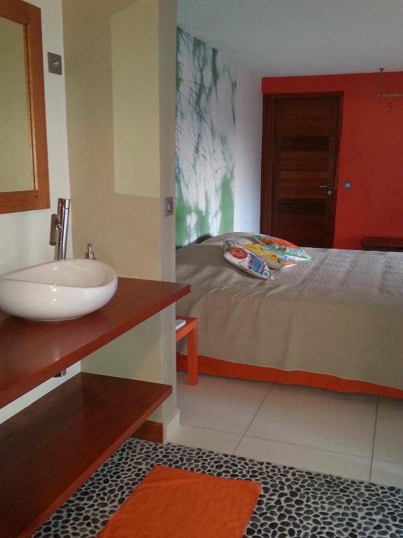 Postel nebo postele na pokoji v ubytování Aluna Ecolodge