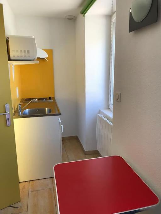 Kuchyňa alebo kuchynka v ubytovaní Immeuble Meroux Moval