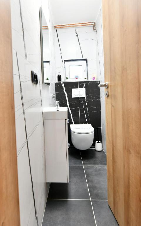 Kúpeľňa v ubytovaní Apartmani Brium