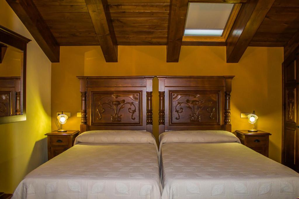 Tempat tidur dalam kamar di EL NIDO DE OLVIDO