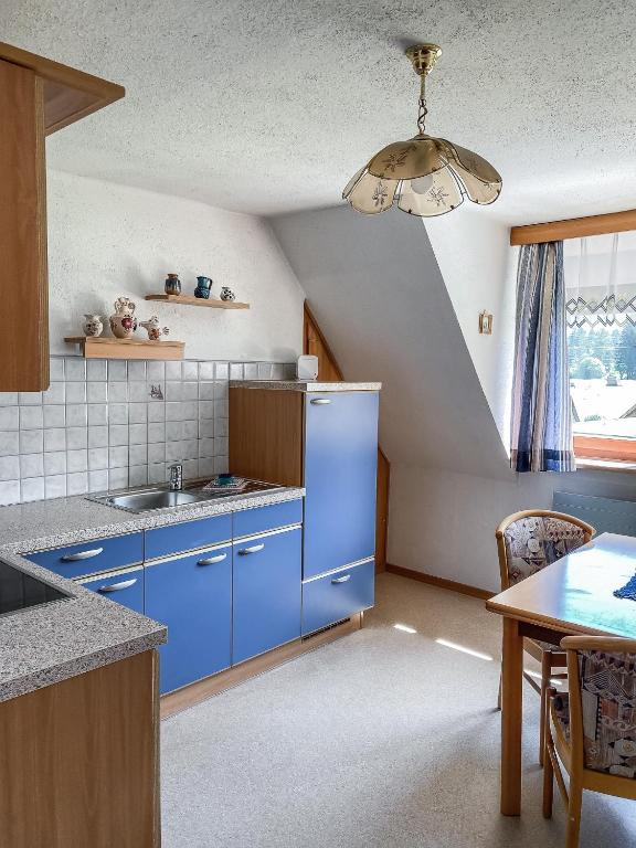 A kitchen or kitchenette at Ferienhaus Mörtl
