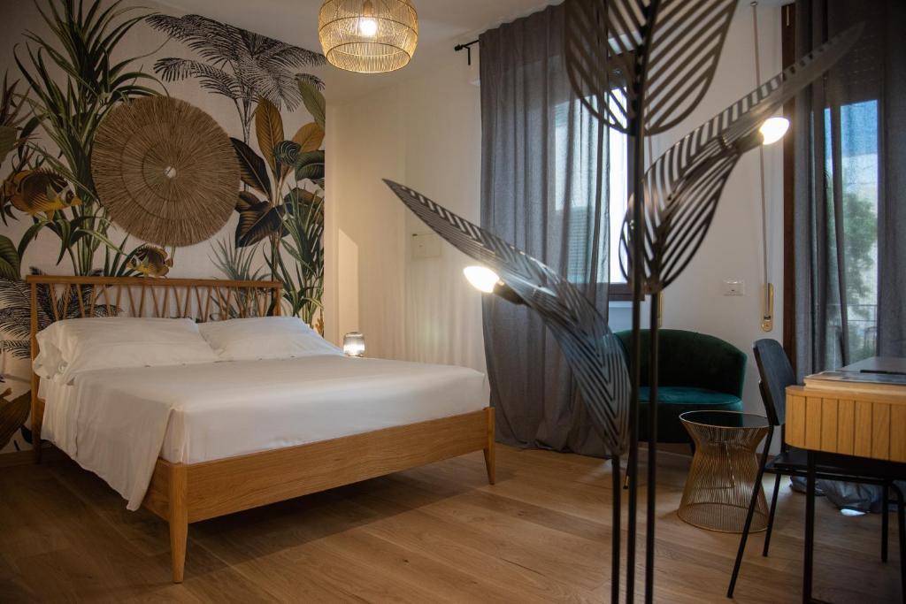 Postel nebo postele na pokoji v ubytování B&B La Marmora 39