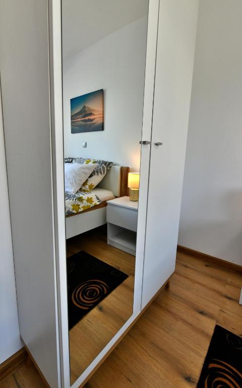 Posteľ alebo postele v izbe v ubytovaní Apartmani Brium