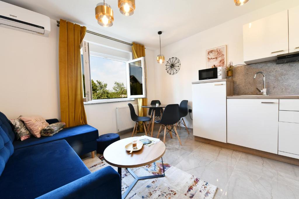 Kuchyňa alebo kuchynka v ubytovaní Apartmani Brium