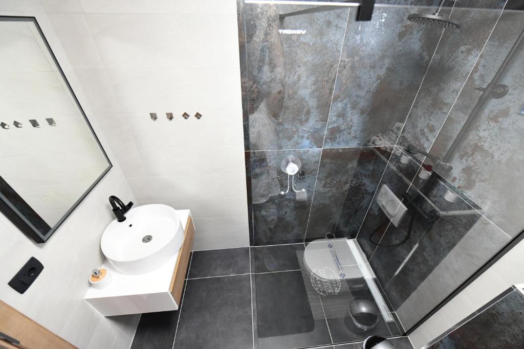 Kúpeľňa v ubytovaní Apartmani Brium
