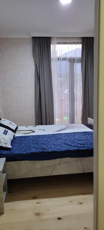 Postel nebo postele na pokoji v ubytování Guest House Guli
