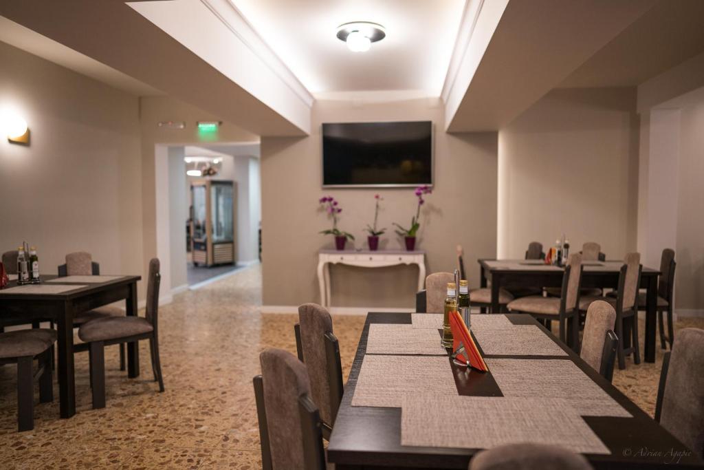 TV a/nebo společenská místnost v ubytování Hotel Hera