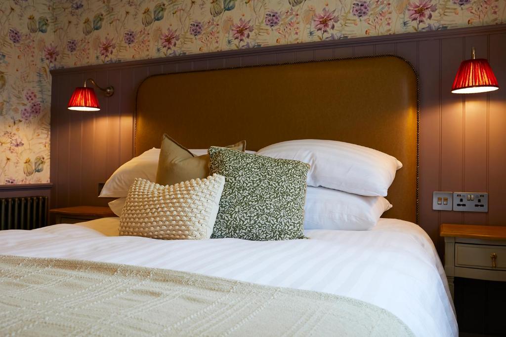 Postel nebo postele na pokoji v ubytování The Grainary Boutique B&B