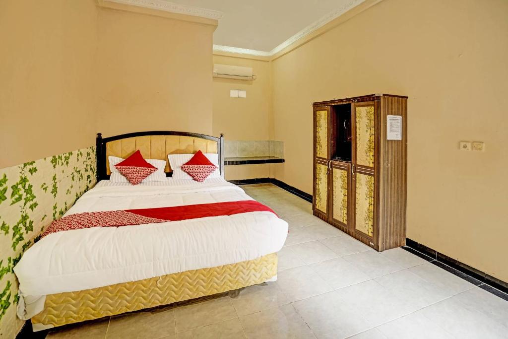 Katil atau katil-katil dalam bilik di OYO 90508 Wisma Kenanga
