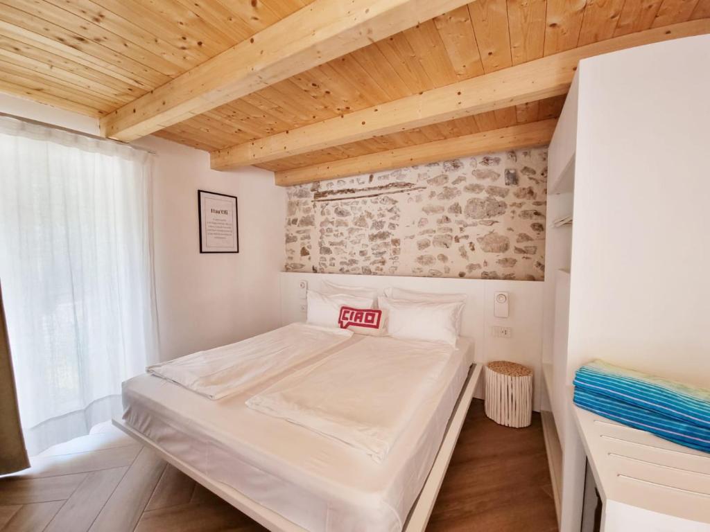 Postel nebo postele na pokoji v ubytování Elle Ecoholiday
