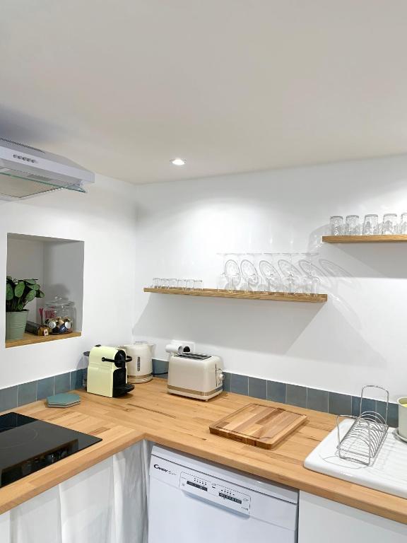 Kuchyň nebo kuchyňský kout v ubytování Appartement au centre de Toulouse