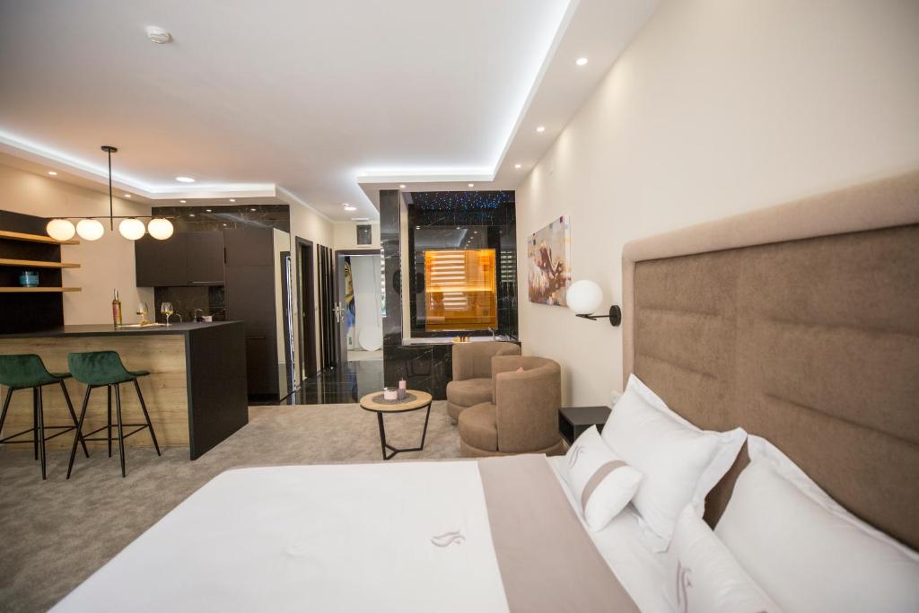 Ένα ή περισσότερα κρεβάτια σε δωμάτιο στο VS Apartmani