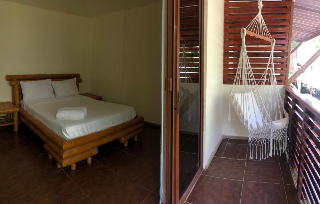 Postel nebo postele na pokoji v ubytování Spondylus Lodge