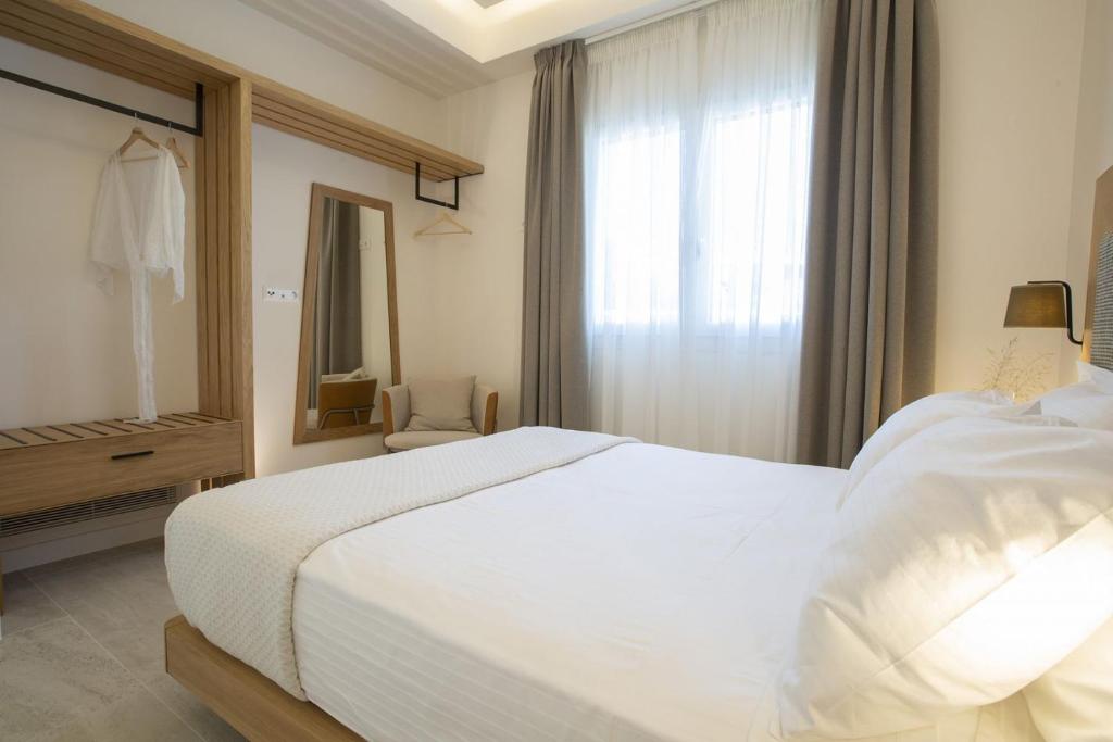 Łóżko lub łóżka w pokoju w obiekcie THE QUAD Luxury Villas