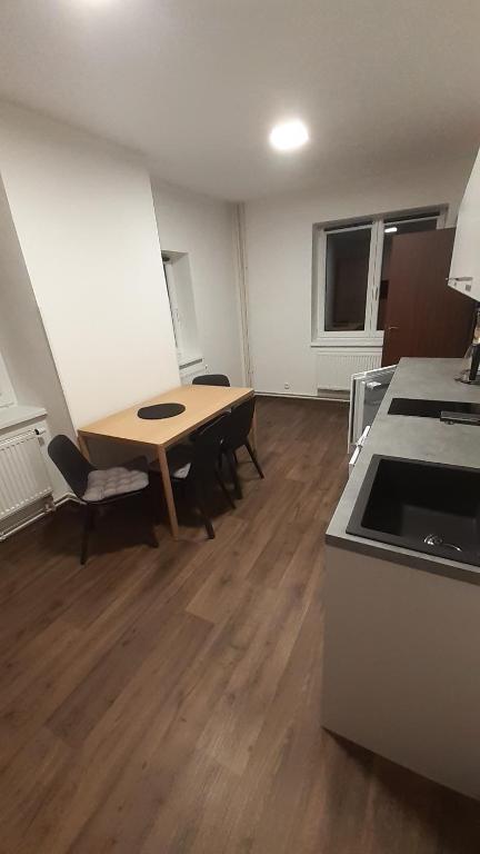 Kuchyň nebo kuchyňský kout v ubytování Apartmány RADOST