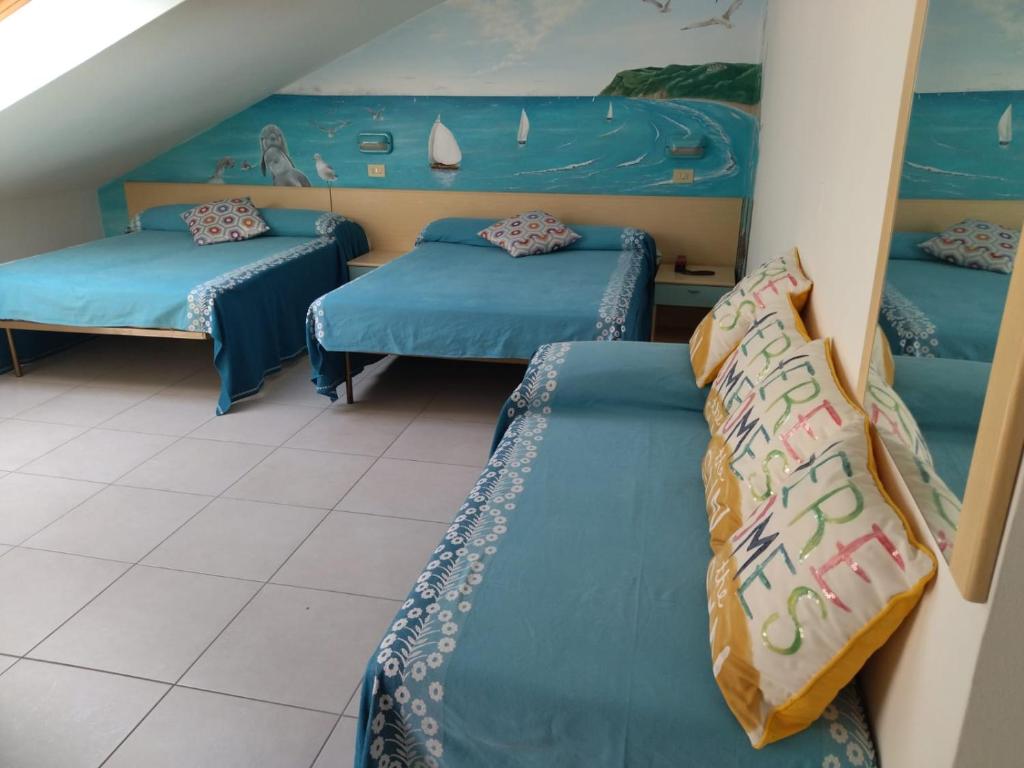 Postel nebo postele na pokoji v ubytování Hotel Des Bains