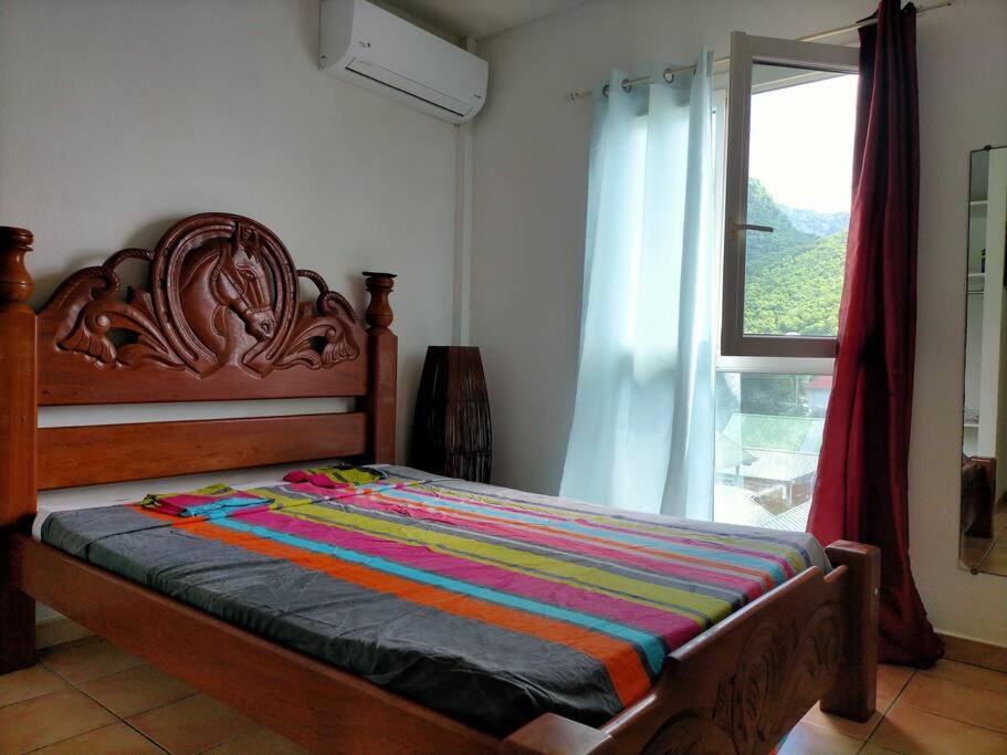 Postel nebo postele na pokoji v ubytování Bel appartement avec piscine, face à la mer