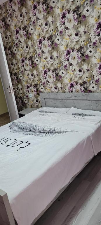 Postel nebo postele na pokoji v ubytování Guest House Guli