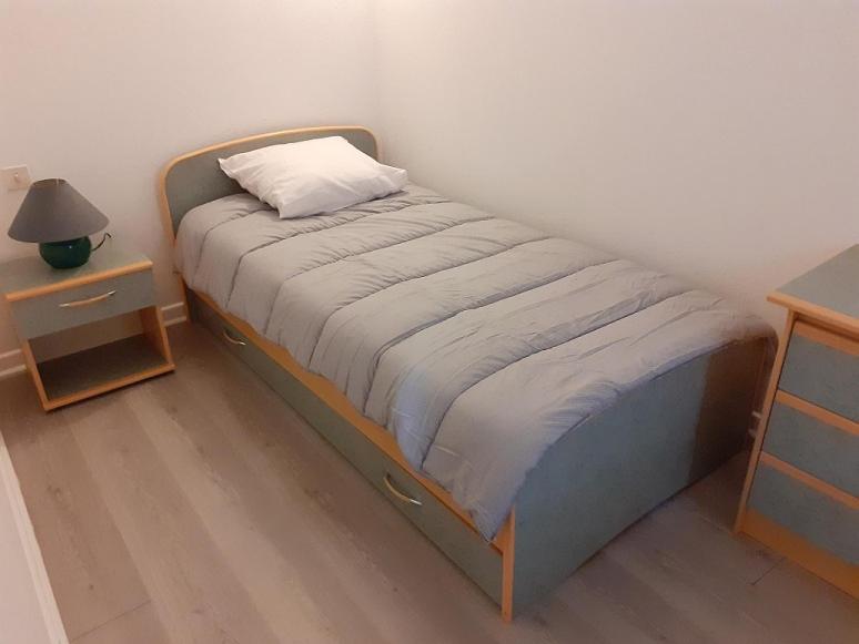 Postel nebo postele na pokoji v ubytování Gîte des Monts de L'Autan