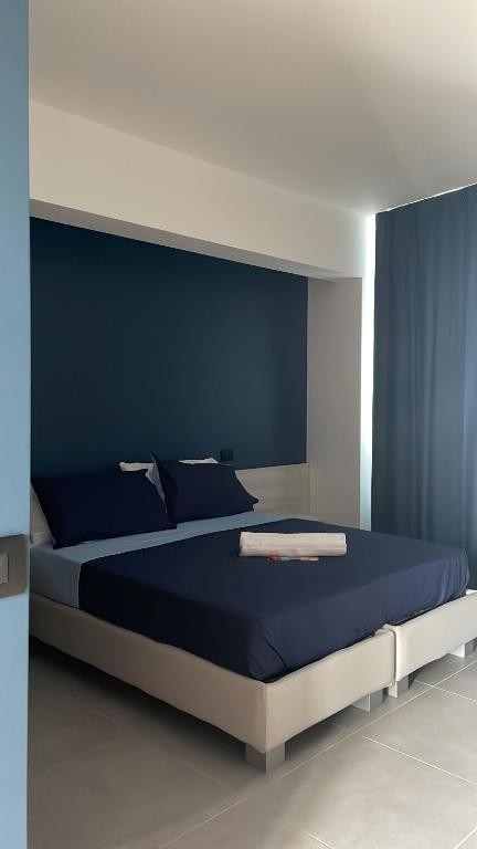 Posteľ alebo postele v izbe v ubytovaní Luna Nova Rooms