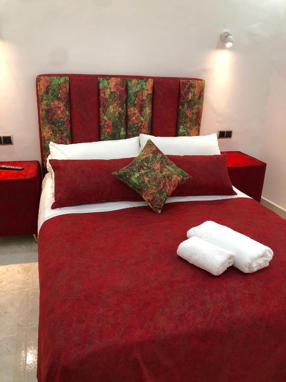 Ένα ή περισσότερα κρεβάτια σε δωμάτιο στο Hotel Palace tanger