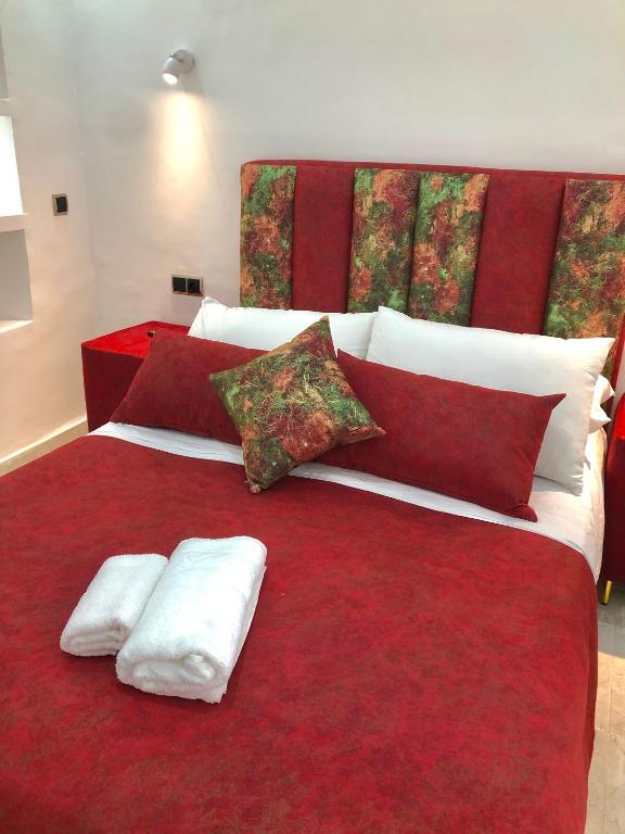 Ένα ή περισσότερα κρεβάτια σε δωμάτιο στο Hotel Palace tanger