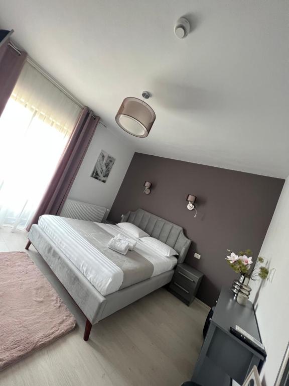 Postel nebo postele na pokoji v ubytování Pensiunea Heaven