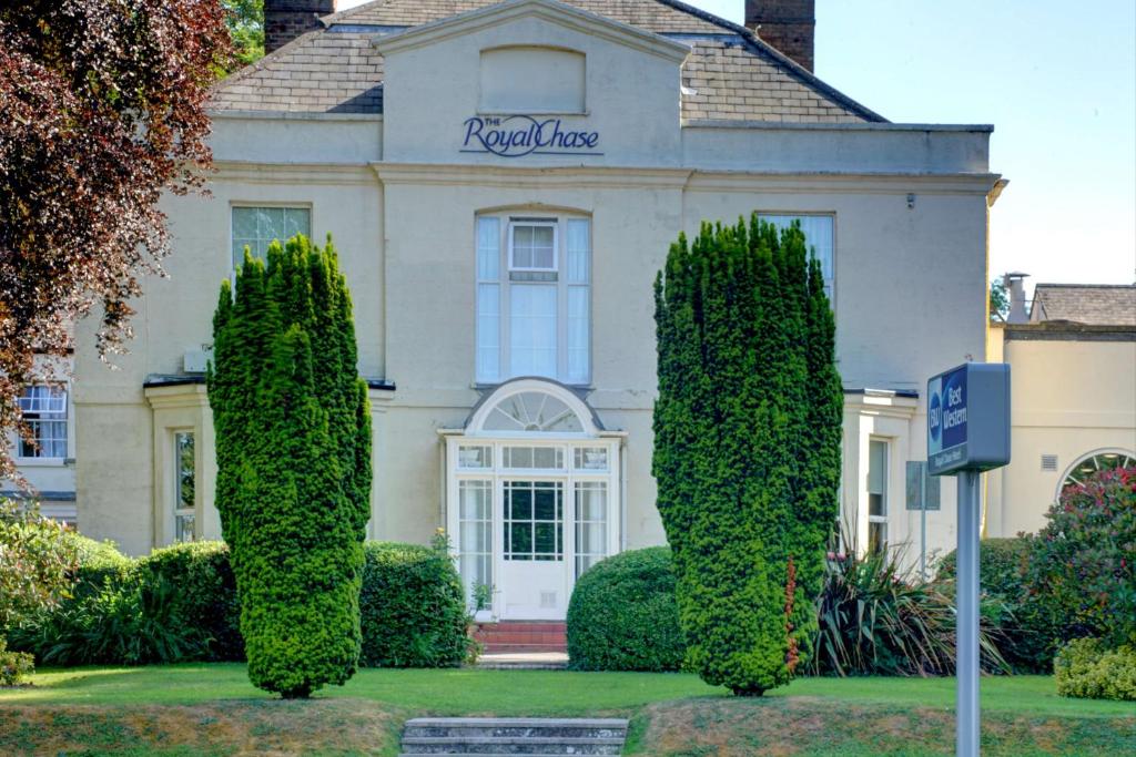 a house with a sign in front of it at Best Western The Royal Chase Hotel in Shaftesbury