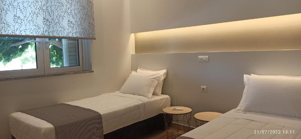 A bed or beds in a room at ERODIOS TOWN