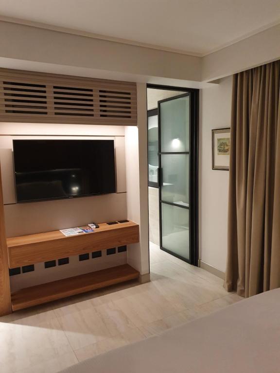 TV a/nebo společenská místnost v ubytování Lastarria Hotel