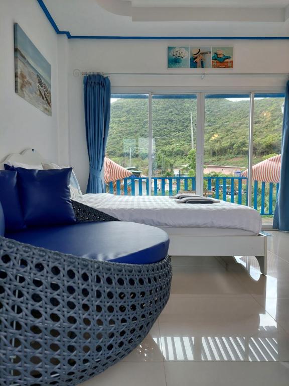 Postel nebo postele na pokoji v ubytování Blue sky Koh larn Resort