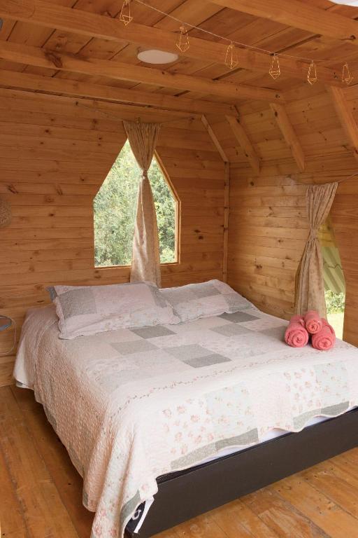 Postel nebo postele na pokoji v ubytování Glamping las 4 estaciones