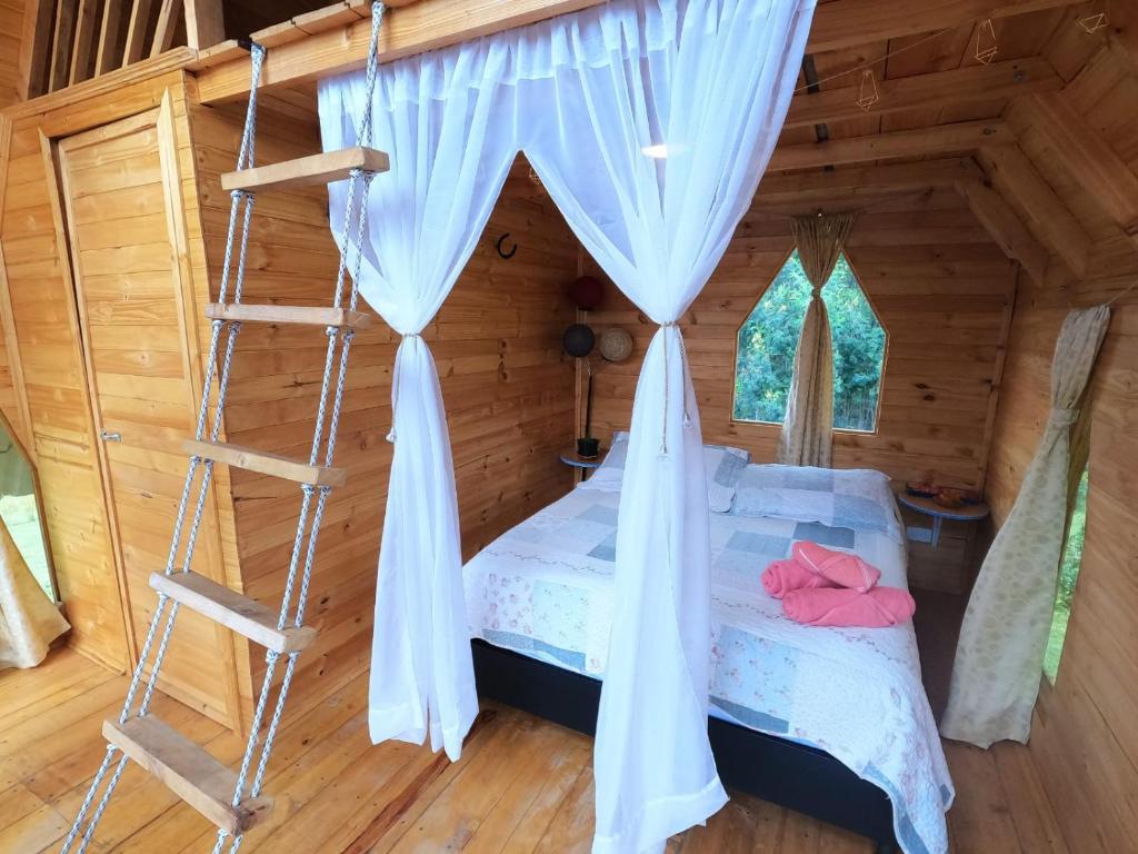 Postel nebo postele na pokoji v ubytování Glamping las 4 estaciones