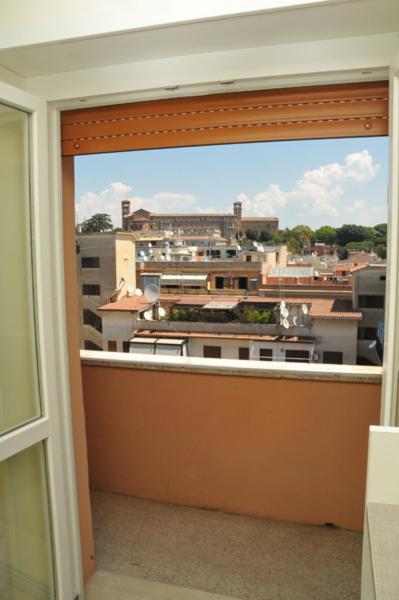 A balcony or terrace at MIGDAL Luxury Suites Roma Testaccio