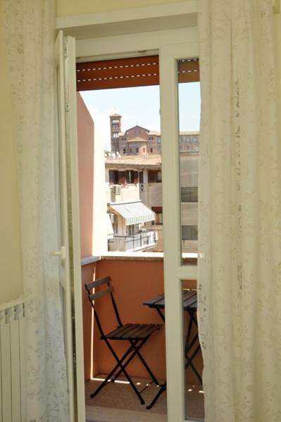 A balcony or terrace at MIGDAL Luxury Suites Roma Testaccio