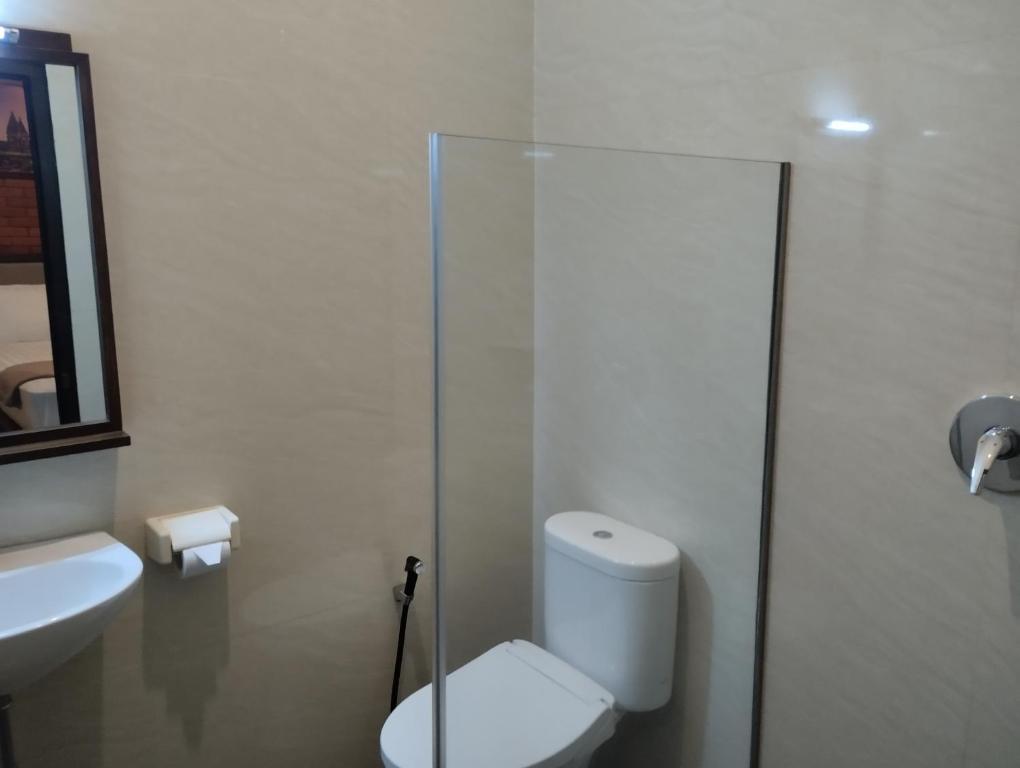 Koupelna v ubytování Omah Watu Homestay