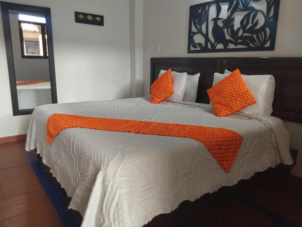 Postel nebo postele na pokoji v ubytování Hotel Cemandy by MA