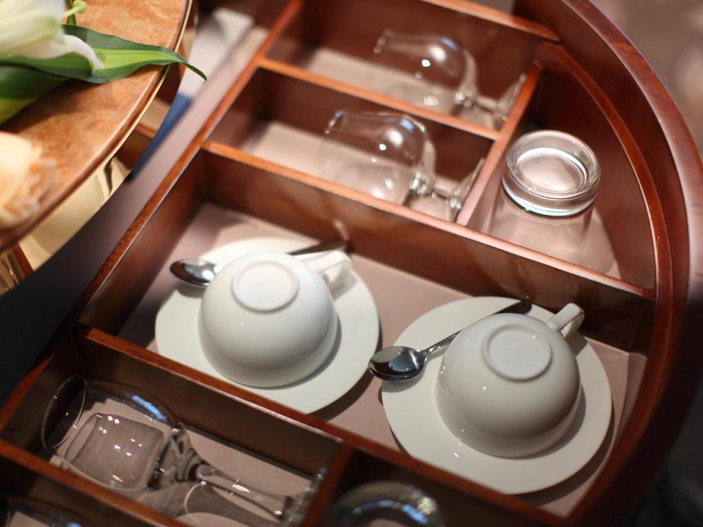 Příslušenství pro přípravu čaje a kávy v ubytování C&D Hotel Quanzhou