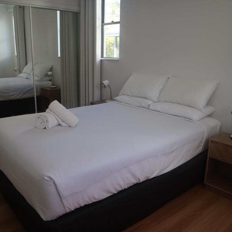 Postel nebo postele na pokoji v ubytování Coolum Beach Resort