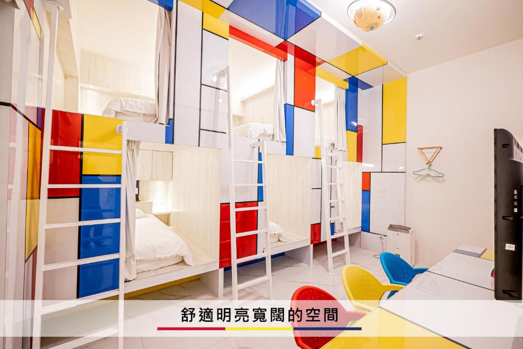 Postel nebo postele na pokoji v ubytování Mondrian Guest House