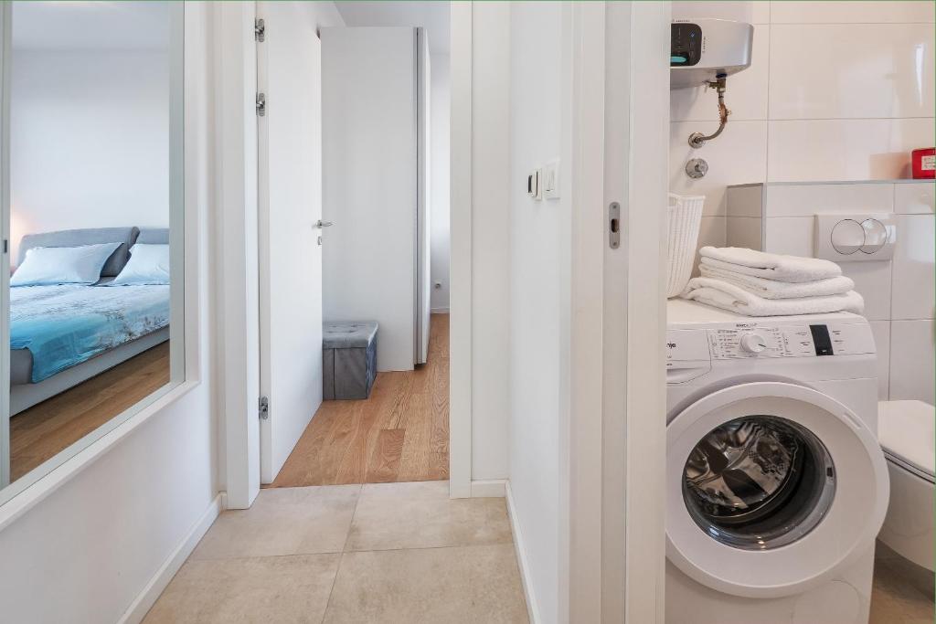 Posteľ alebo postele v izbe v ubytovaní Sea view with garden apartment Joshua