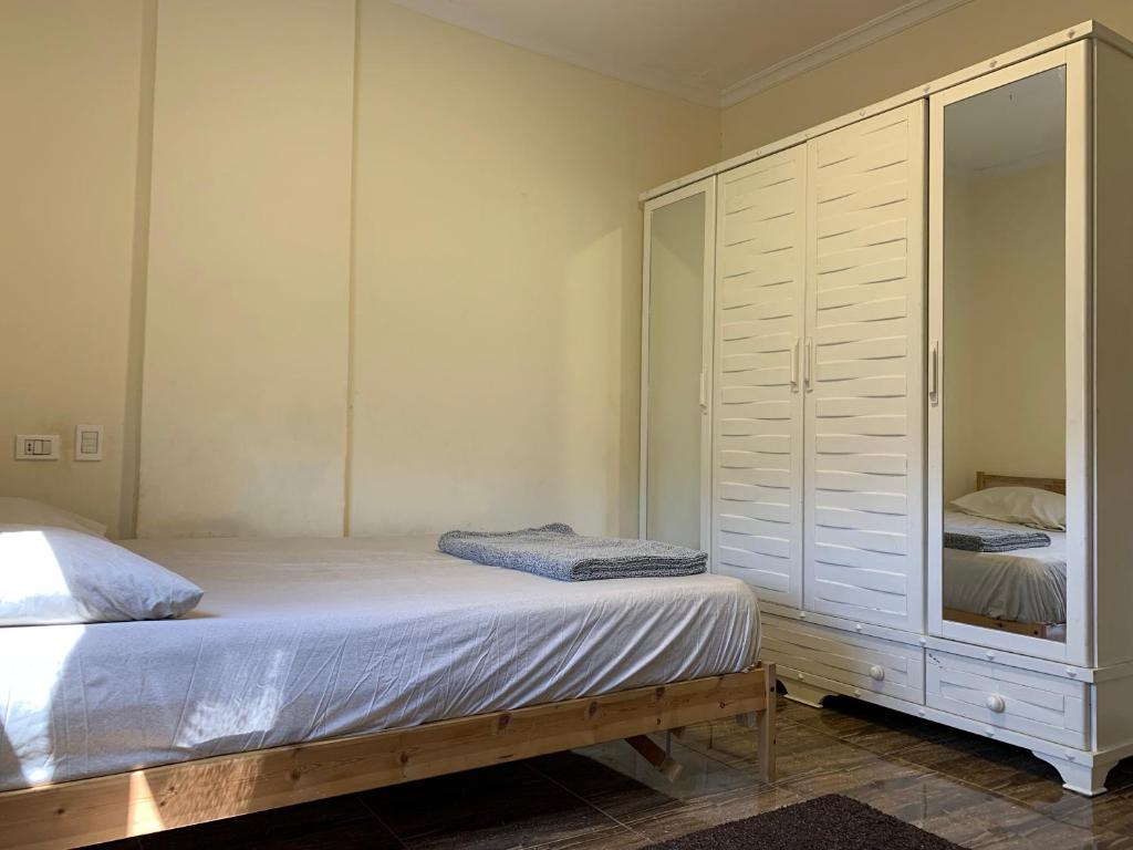 Postel nebo postele na pokoji v ubytování Modern downtown Sheikh Zayed Condo