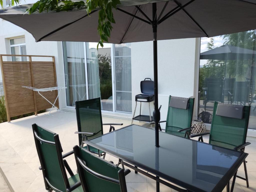 A patio or other outdoor area at Las Brisas Garden Apartment
