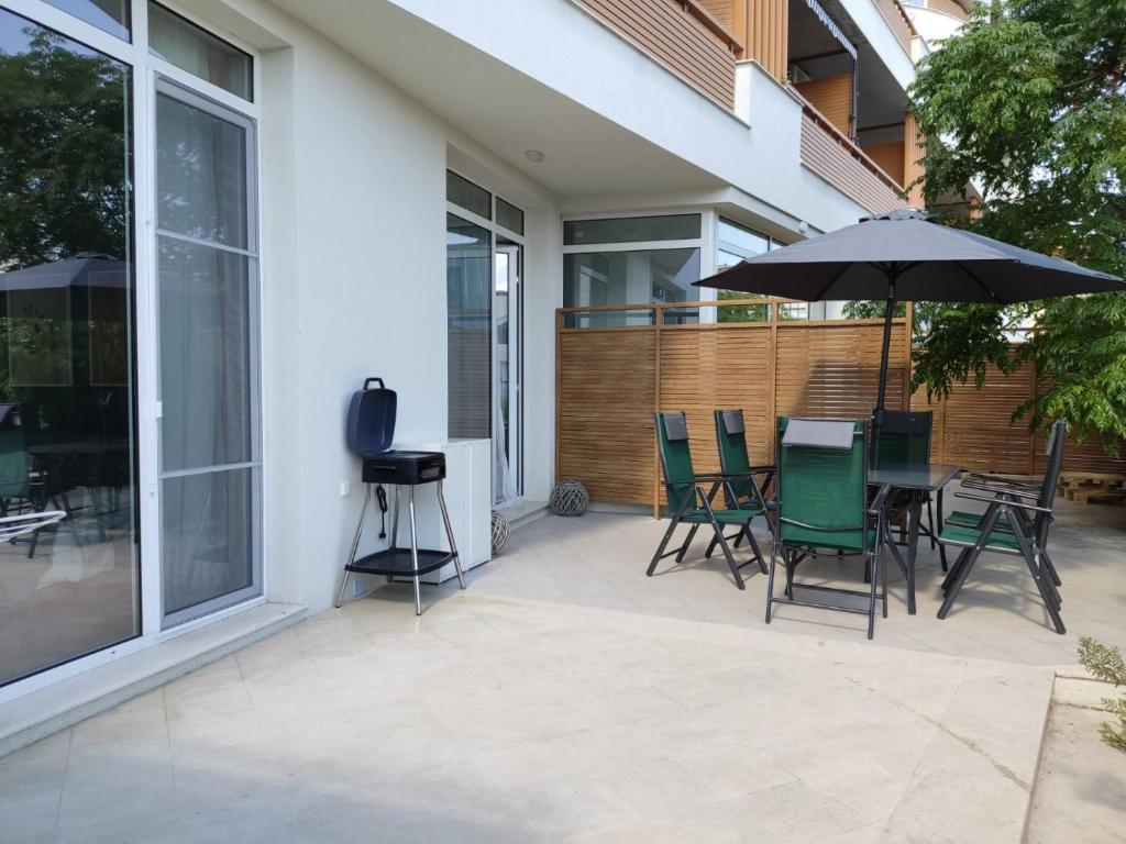 A patio or other outdoor area at Las Brisas Garden Apartment