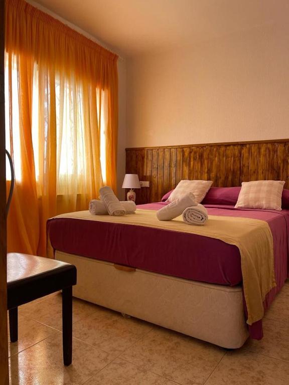Posteľ alebo postele v izbe v ubytovaní Rooms Pineda