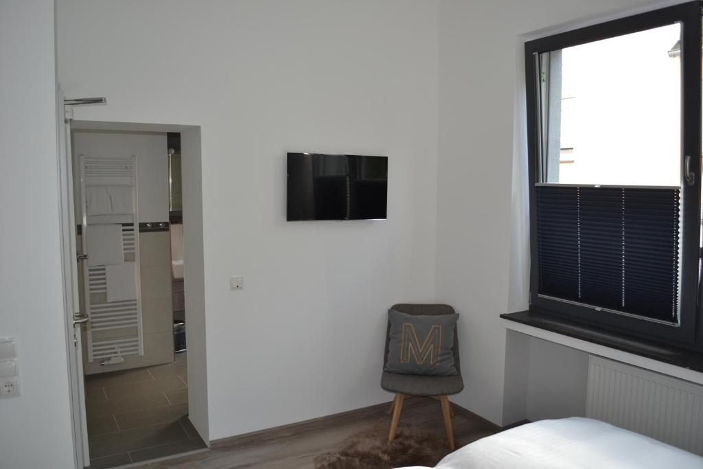 Postel nebo postele na pokoji v ubytování Boutique-Hotel "Stilvoll"