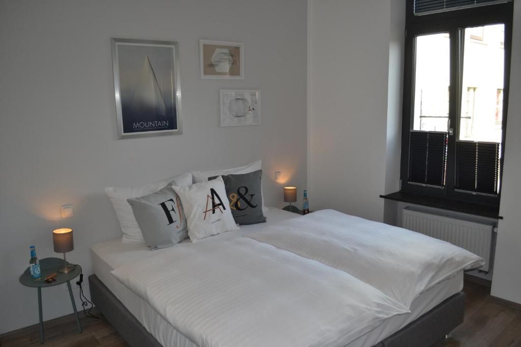 Postel nebo postele na pokoji v ubytování Boutique-Hotel "Stilvoll"