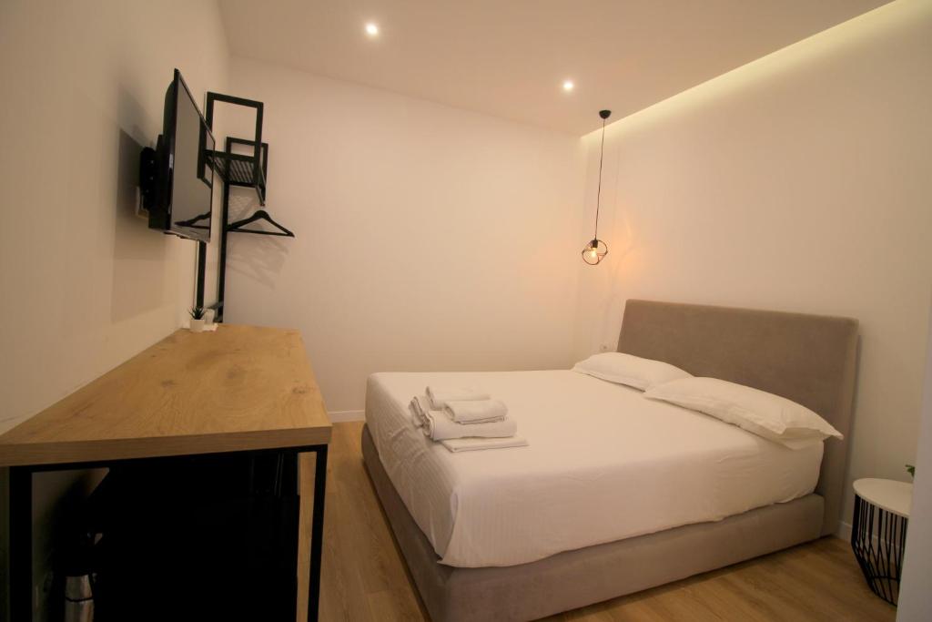 Postel nebo postele na pokoji v ubytování Hotel Qurku 2